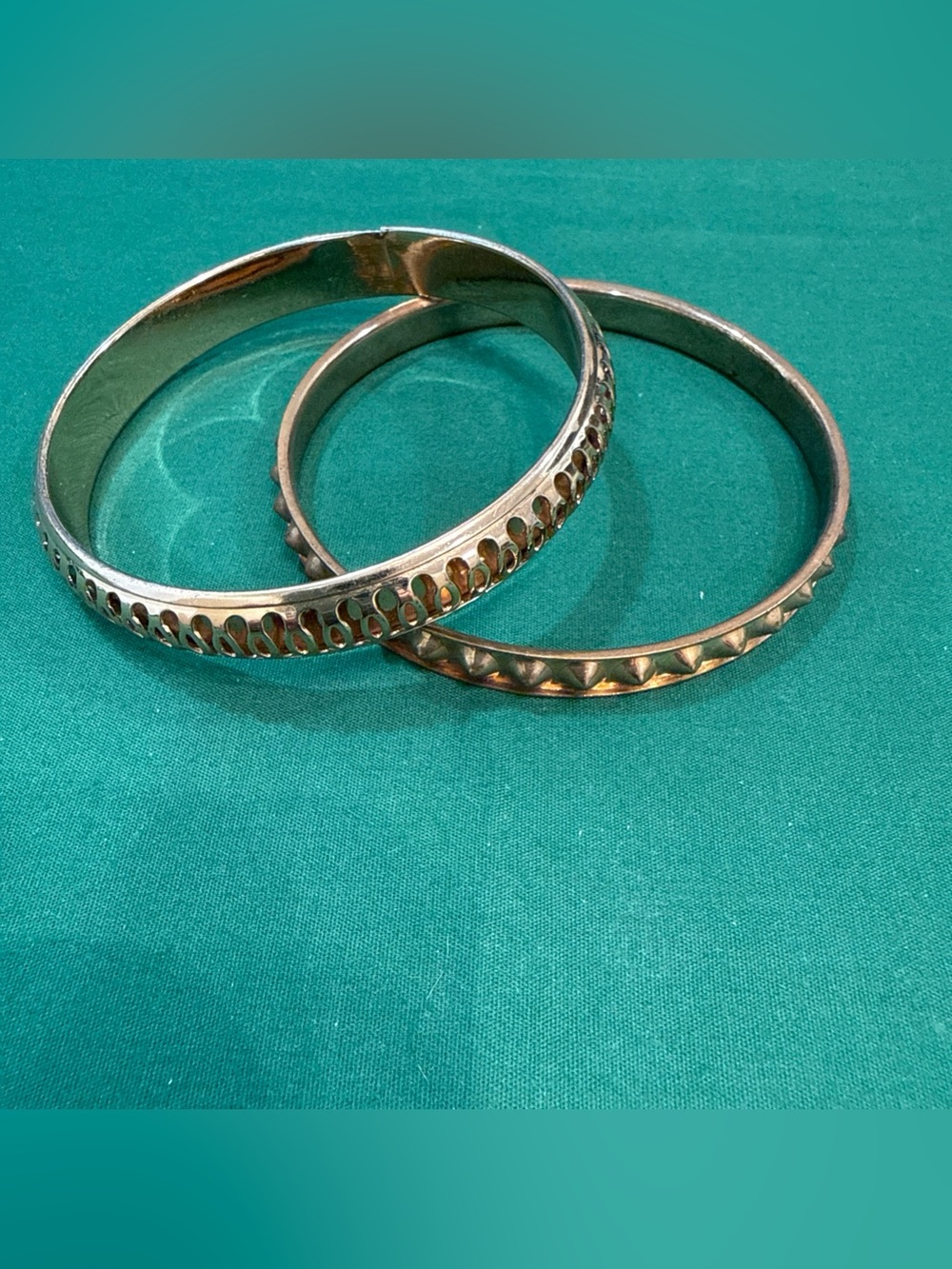 2 Goldtone Bangle Bracelets With Distinct Texture Designs. 36E